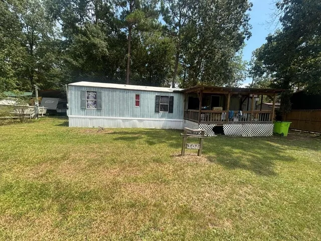 a view of a house with swimming pool
