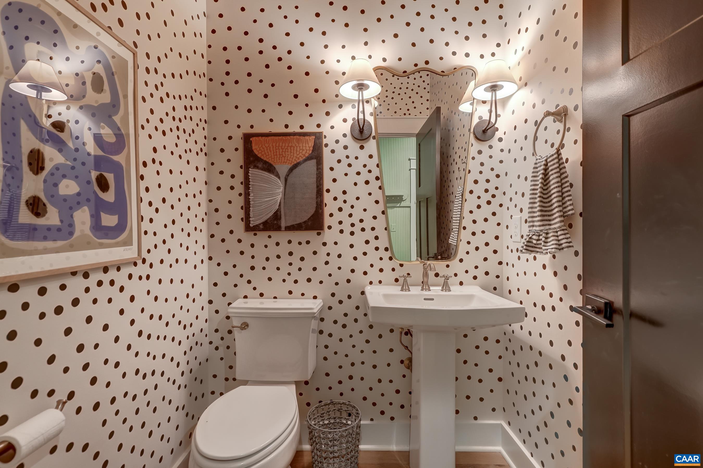 3327 Rowcross Street Crozet, VA 22932 - Photo 31 of 63 Powder room with custom wall treatment and pedestal sink.