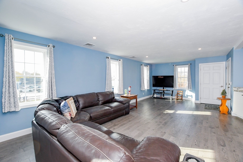 9 Old Glen Charlie Road Wareham, MA 02538 - Photo 12 of 42 a living room with furniture and a flat screen tv