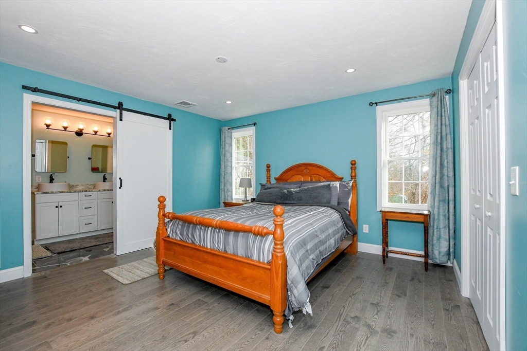 9 Old Glen Charlie Road Wareham, MA 02538 - Photo 14 of 42 a bedroom with a bed and a filled window in it
