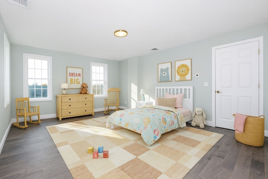 9 Old Glen Charlie Road Wareham, MA 02538 - Photo 25 of 42 a spacious bedroom with a bed and wooden floor