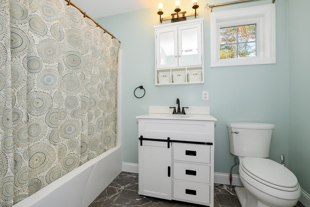 9 Old Glen Charlie Road Wareham, MA 02538 - Photo 27 of 42 a bathroom with a sink a toilet and a bathtub