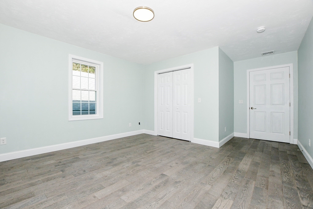 9 Old Glen Charlie Road Wareham, MA 02538 - Photo 28 of 42 an empty room with windows