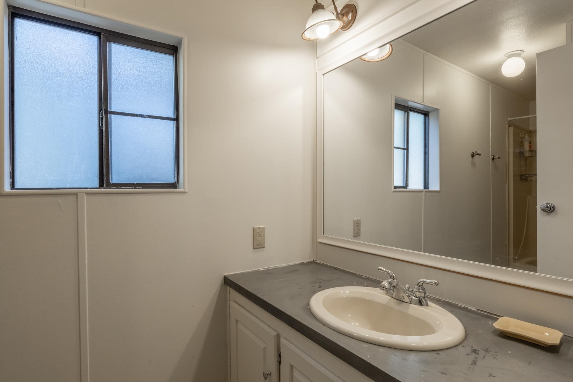 100 Ski Trails Road, Unit 51 Mammoth Lakes, CA 93546 - Photo 21 of 28 a bathroom with a sink and a mirror