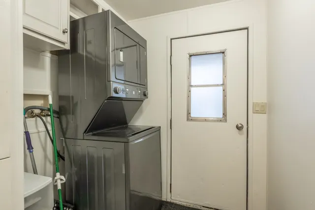 a bathroom with a sink a mirror and vanity