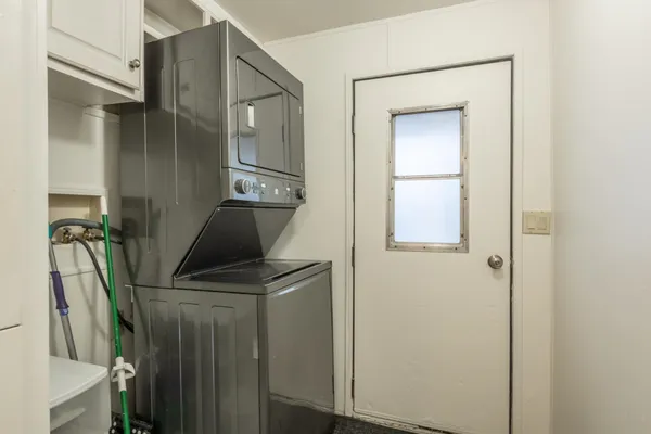 a bathroom with a sink a mirror and vanity