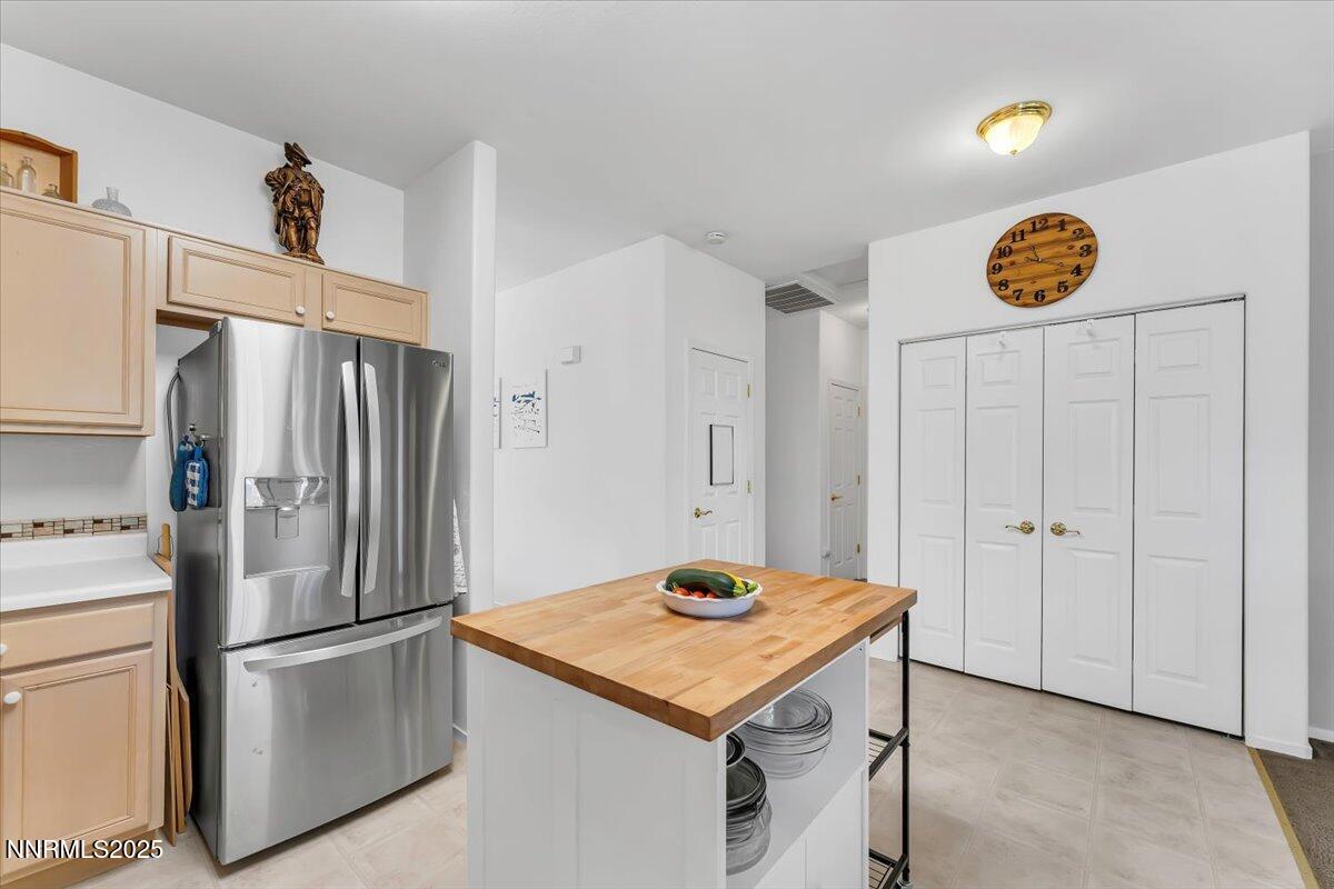 5921 Sapphire Ridge Court Reno, NV 89523 - Photo 15 of 31 a kitchen with stainless steel appliances a refrigerator and a stove