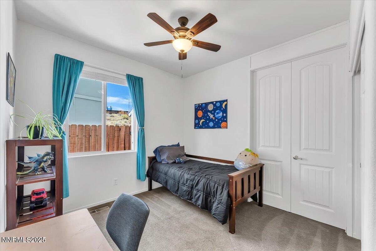 5921 Sapphire Ridge Court Reno, NV 89523 - Photo 18 of 31 a living room with furniture and a large window