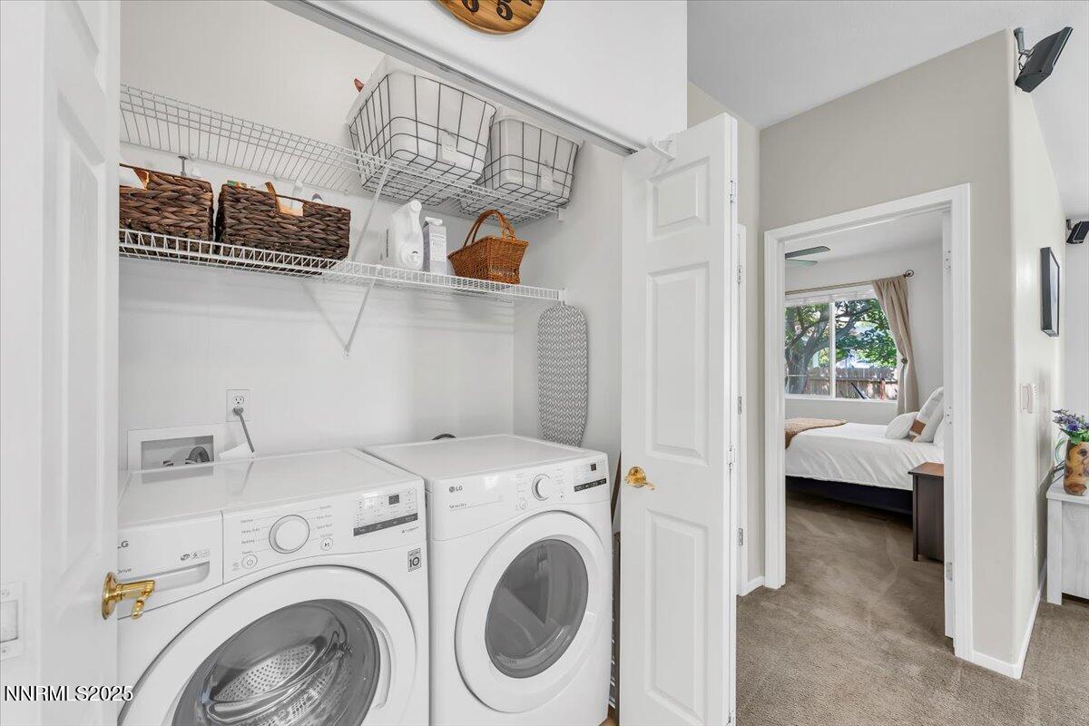 5921 Sapphire Ridge Court Reno, NV 89523 - Photo 22 of 31 a view of bedroom with washer and dryer