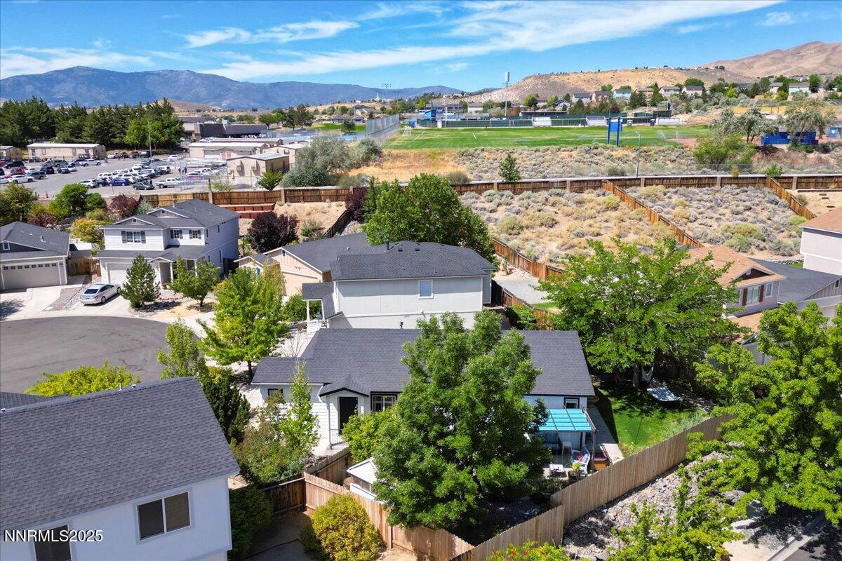 5921 Sapphire Ridge Court Reno, NV 89523 - Photo 27 of 31 an aerial view of residential houses with outdoor space and ocean view