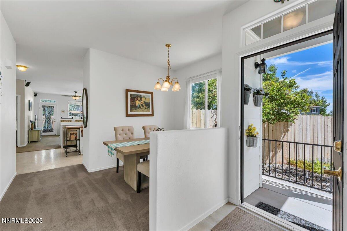 5921 Sapphire Ridge Court Reno, NV 89523 - Photo 3 of 31 a view of a hallway with furniture and front door