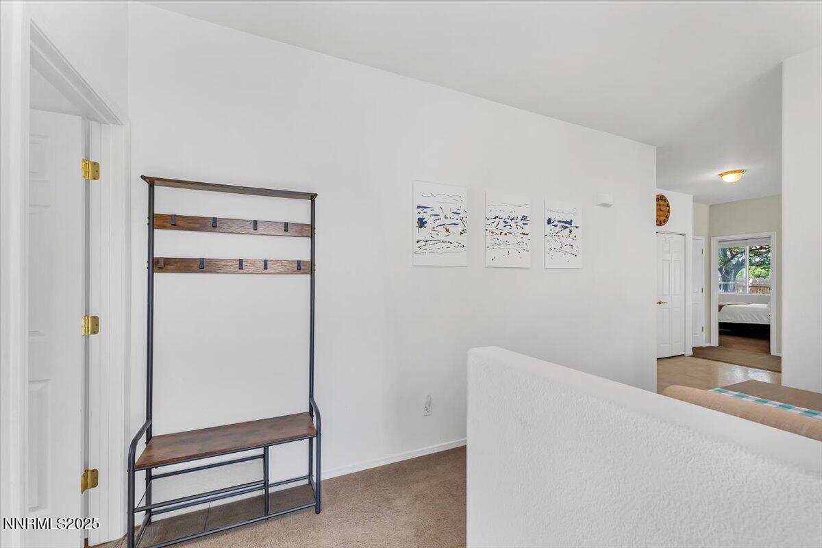 5921 Sapphire Ridge Court Reno, NV 89523 - Photo 4 of 31 a view of a hallway with staircase