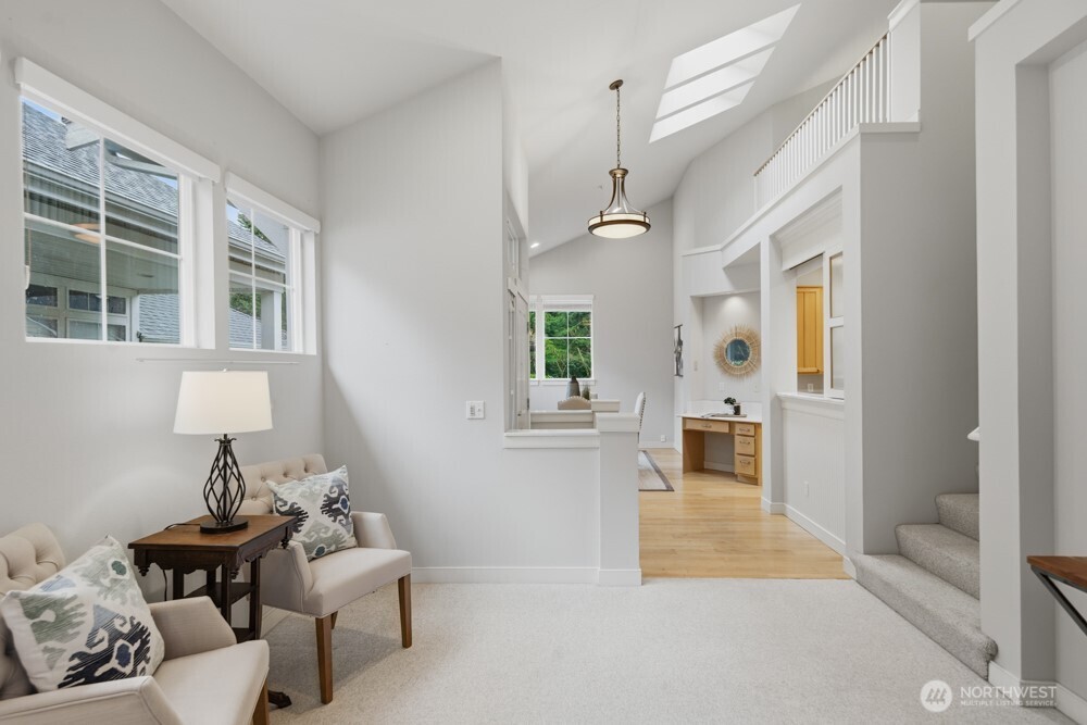 120 Newport Way Northwest, Unit 9 Issaquah, WA 98027 - Photo 15 of 40 a living room with furniture and entry gate