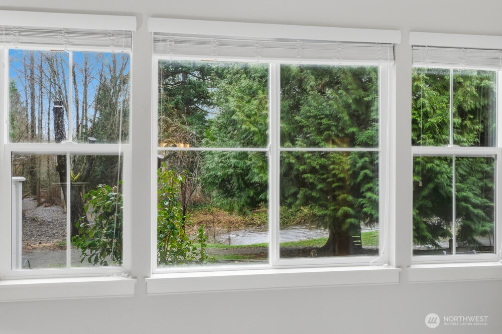 120 Newport Way Northwest, Unit 9 Issaquah, WA 98027 - Photo 24 of 40 a view of a garden from a window