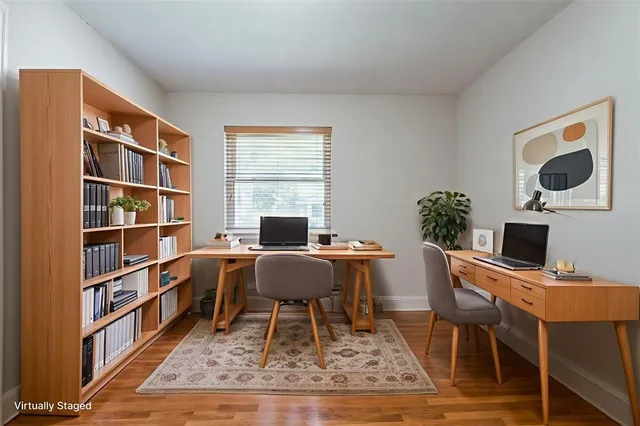 a view of a workspace with furniture