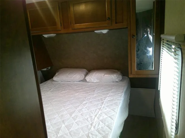 a bathroom with a granite countertop sink