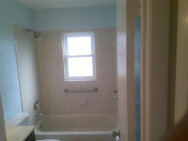 a bathroom with a bathtub