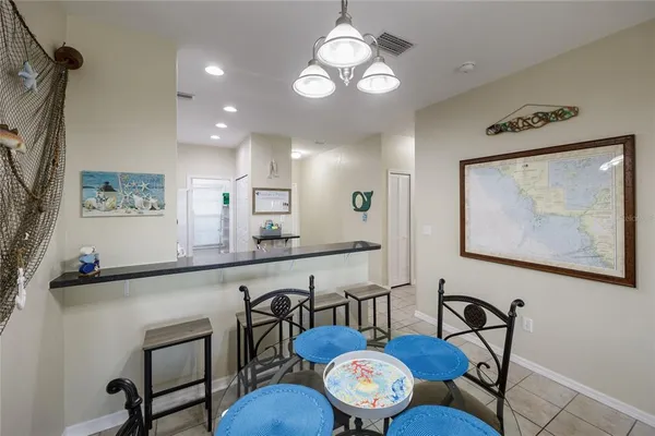 a view of a dining room with furniture