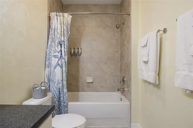 a view of a bathroom from the hallway