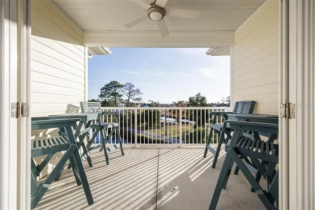 an aerial view of house with yard