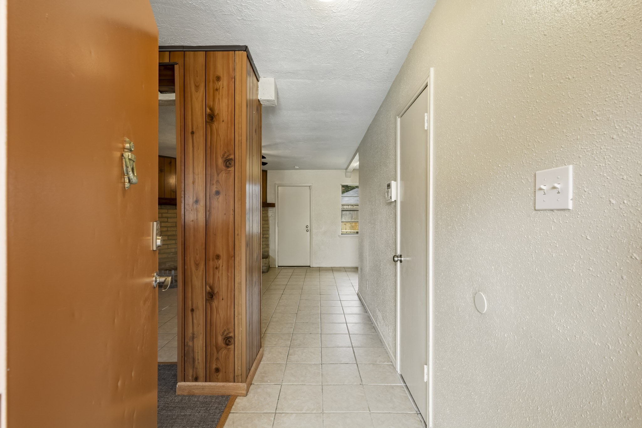 5315 Ridgestone Street Houston, TX 77053 - Photo 3 of 19 Step inside to a tiled entryway leading into the main living areas.