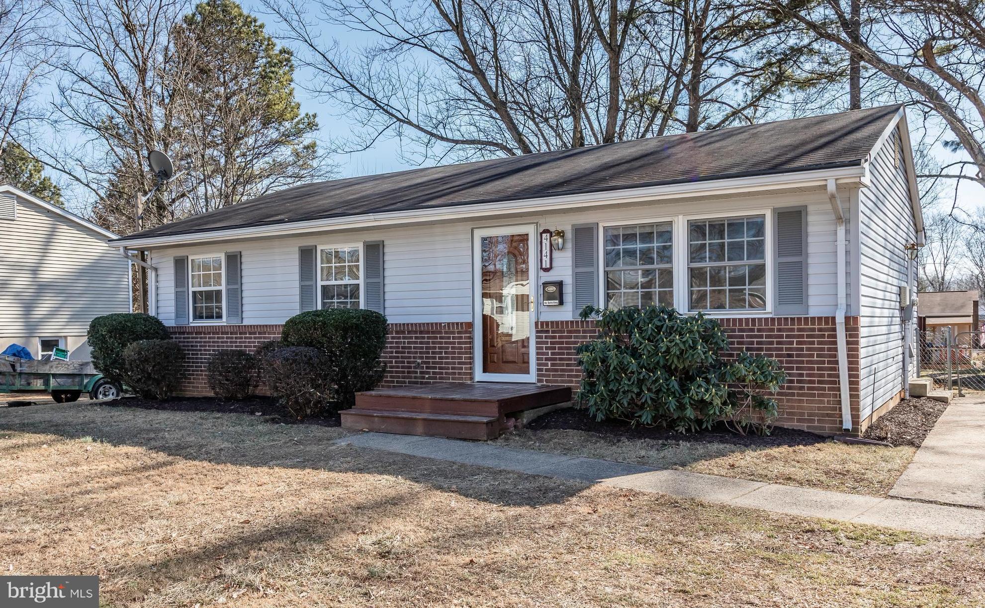 4141 Granby Road Woodbridge, VA 22193 - Photo 1 of 30 a view of a house with a yard and plants