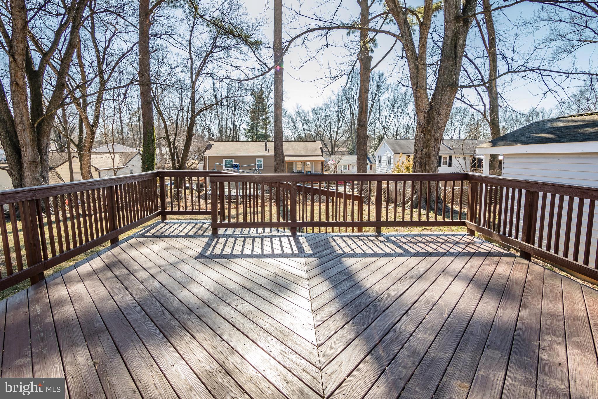 4141 Granby Road Woodbridge, VA 22193 - Photo 23 of 30 a view of deck with wooden floor and trees