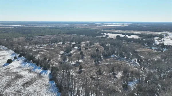a view of city with ocean