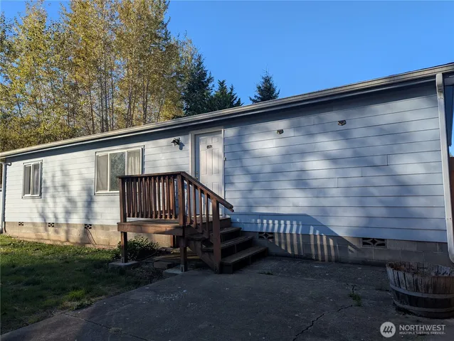 a view of a backyard with a deck