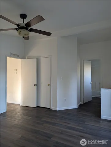 a view of a livingroom with wooden floor