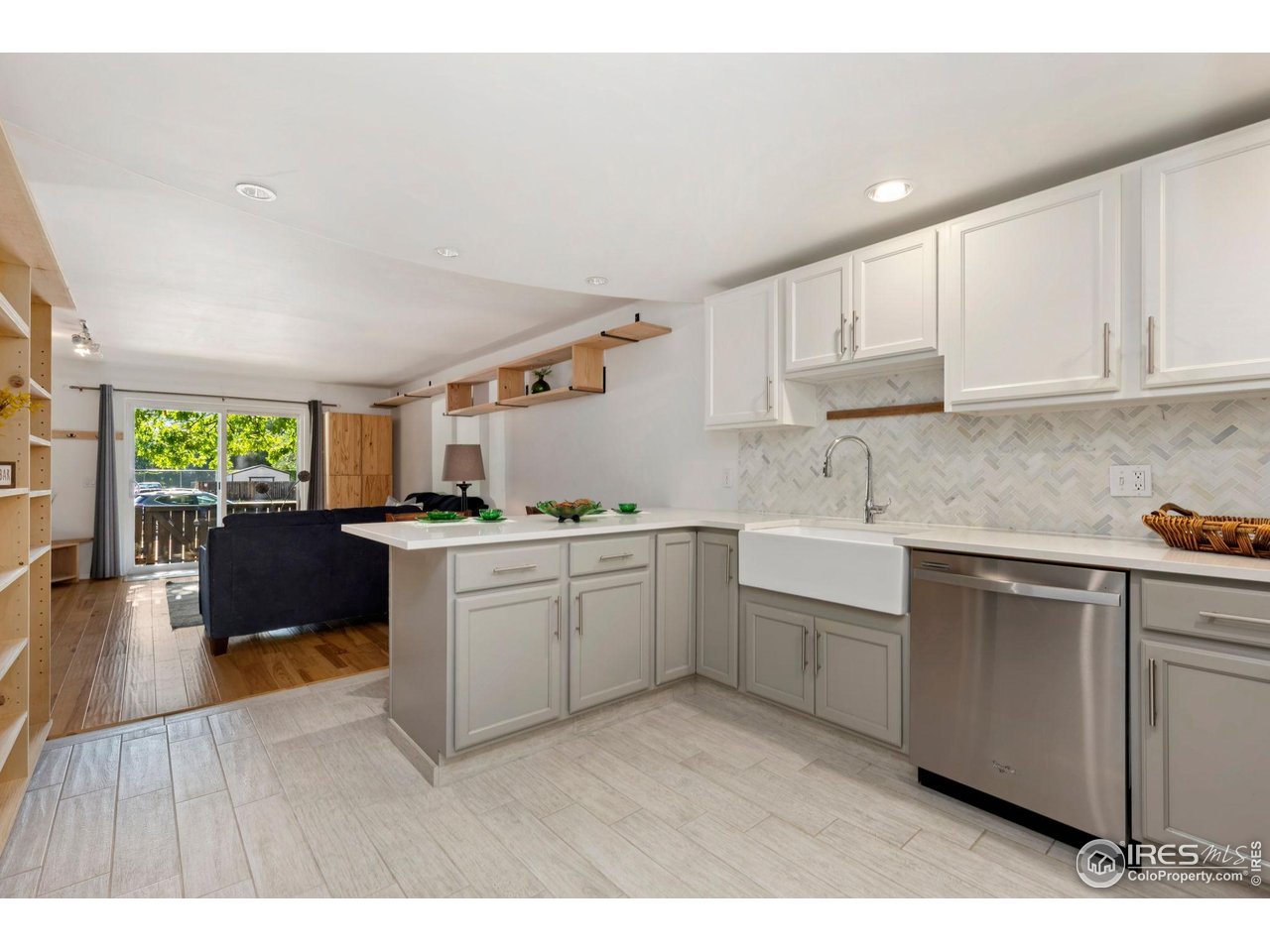 3250 Oneal Circle, Unit 10 Boulder, CO 80301 - Photo 2 of 20 a kitchen with a sink cabinets and window