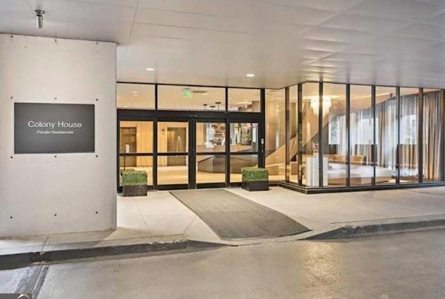 a view of a room with a large window