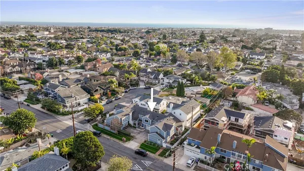 an aerial view of a city with lots of residential buildings