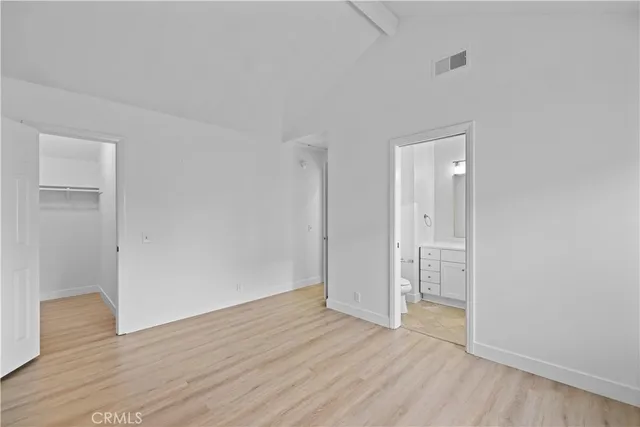 a view of wooden floor in an empty room