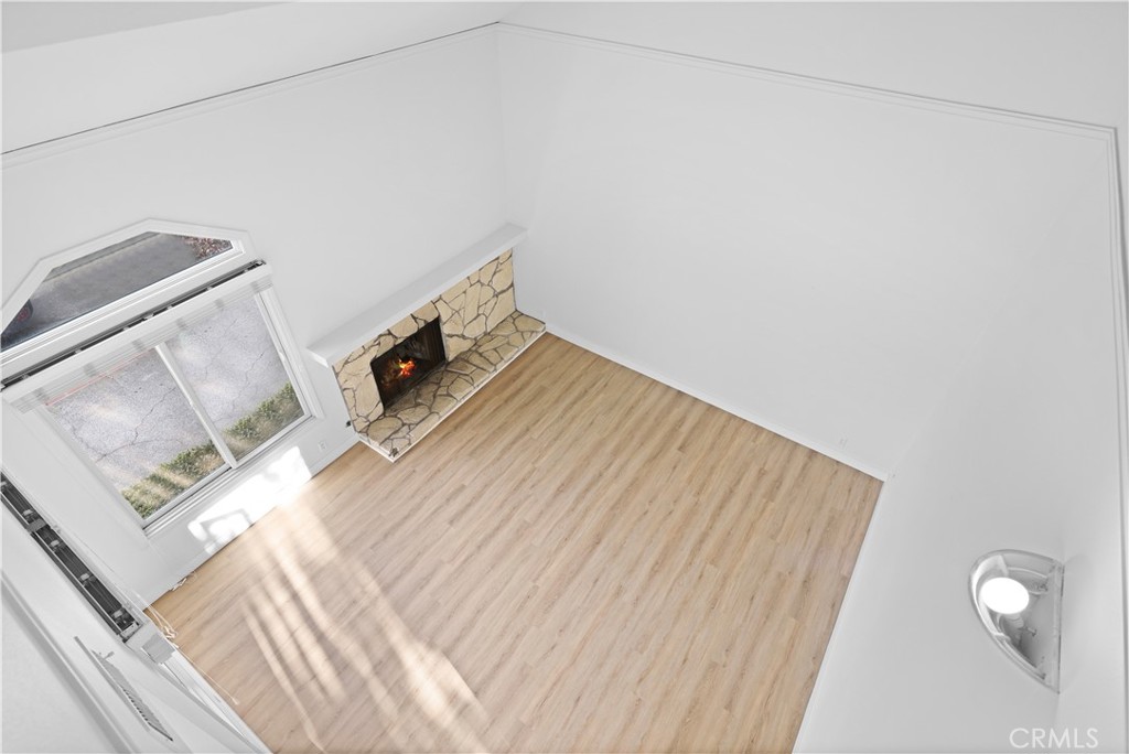 1597 Riverside Place Costa Mesa, CA 92627 - Photo 27 of 37 a view of a hardwood floor in a room