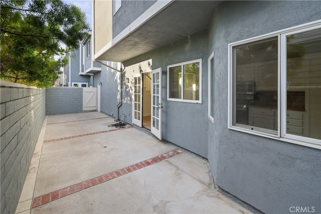 1597 Riverside Place Costa Mesa, CA 92627 - Photo 36 of 37 a view of a house with a backyard