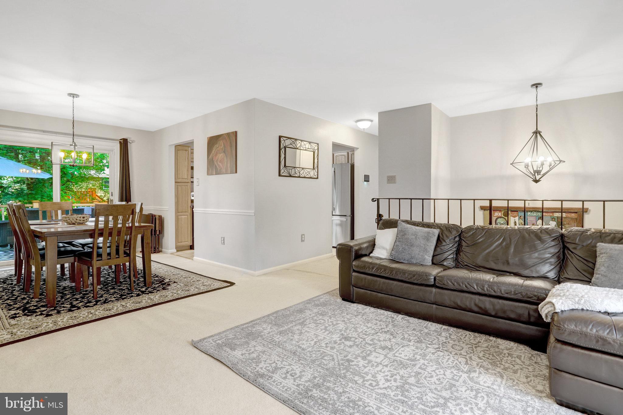 4518 Flintstone Road Alexandria, VA 22306 - Photo 11 of 62 a living room with furniture and a table