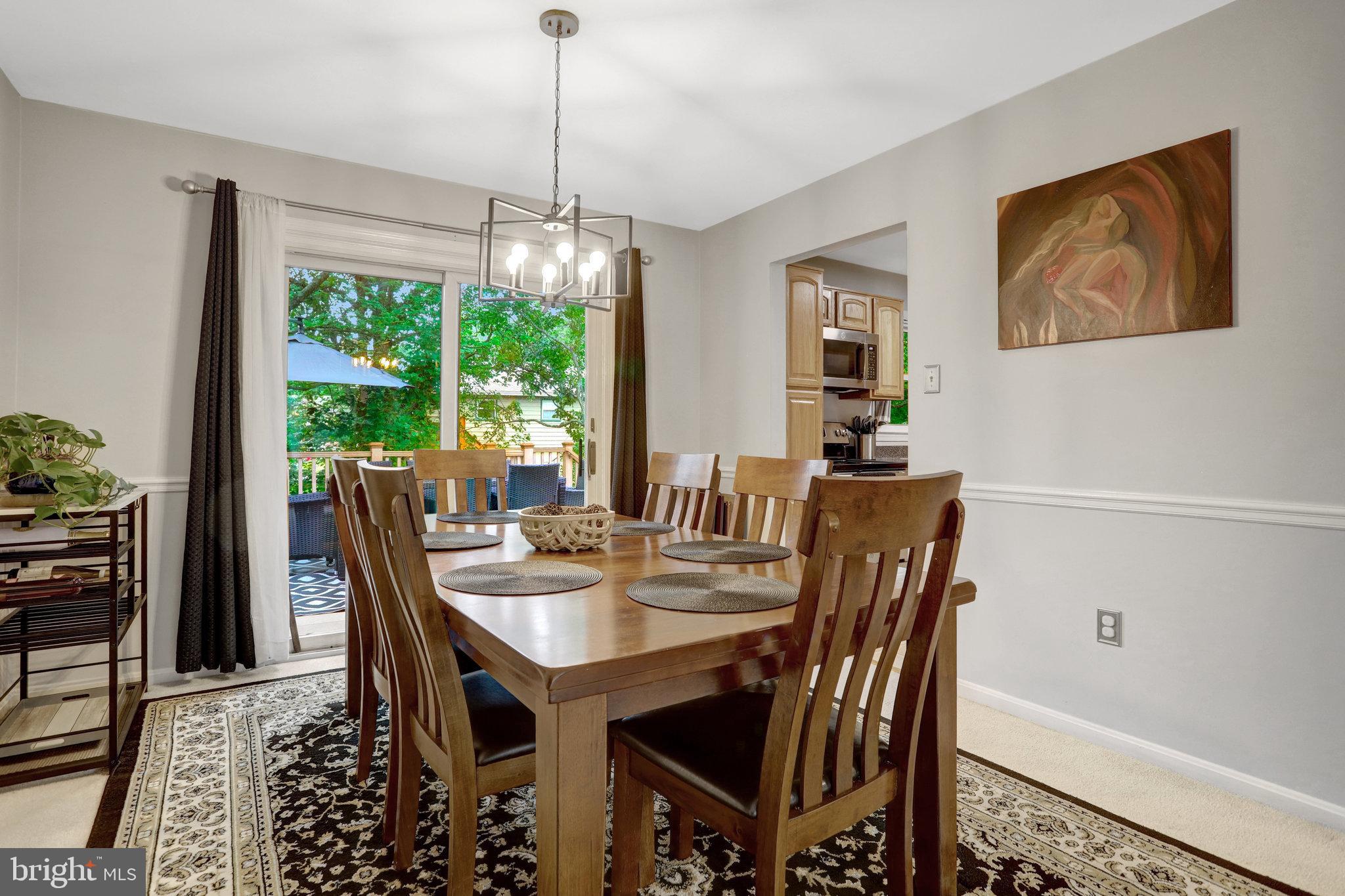 4518 Flintstone Road Alexandria, VA 22306 - Photo 15 of 62 a view of a dining room with furniture window and outside view