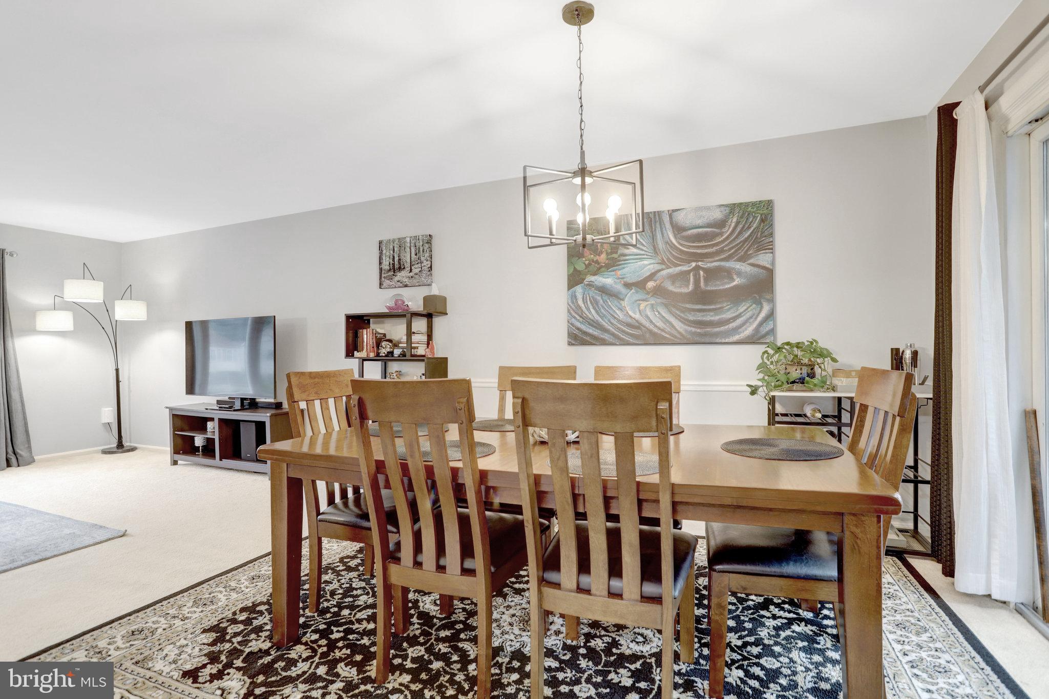 4518 Flintstone Road Alexandria, VA 22306 - Photo 16 of 62 a view of a dining room with furniture