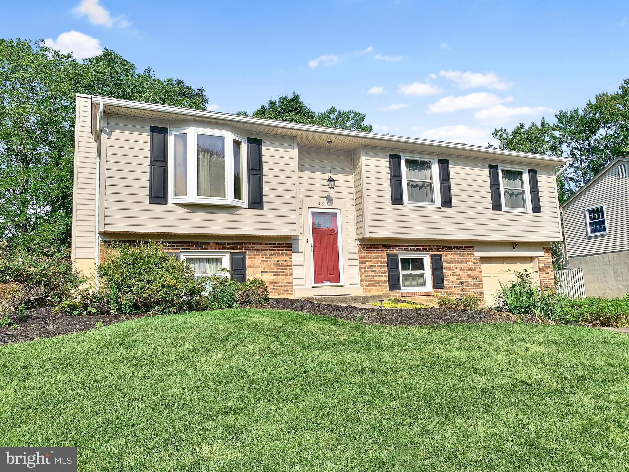 4518 Flintstone Road Alexandria, VA 22306 - Photo 2 of 62 a front view of a house with a yard
