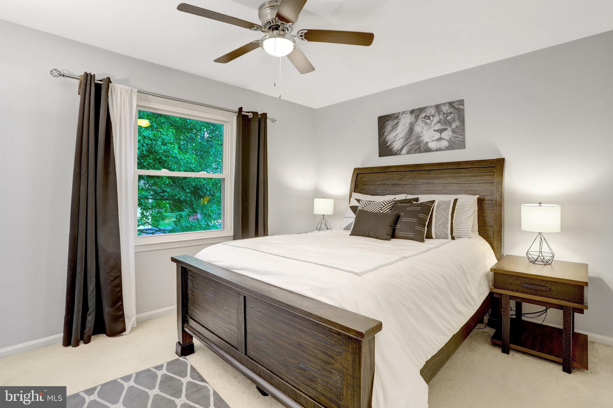 4518 Flintstone Road Alexandria, VA 22306 - Photo 22 of 62 a bedroom with a bed and a window