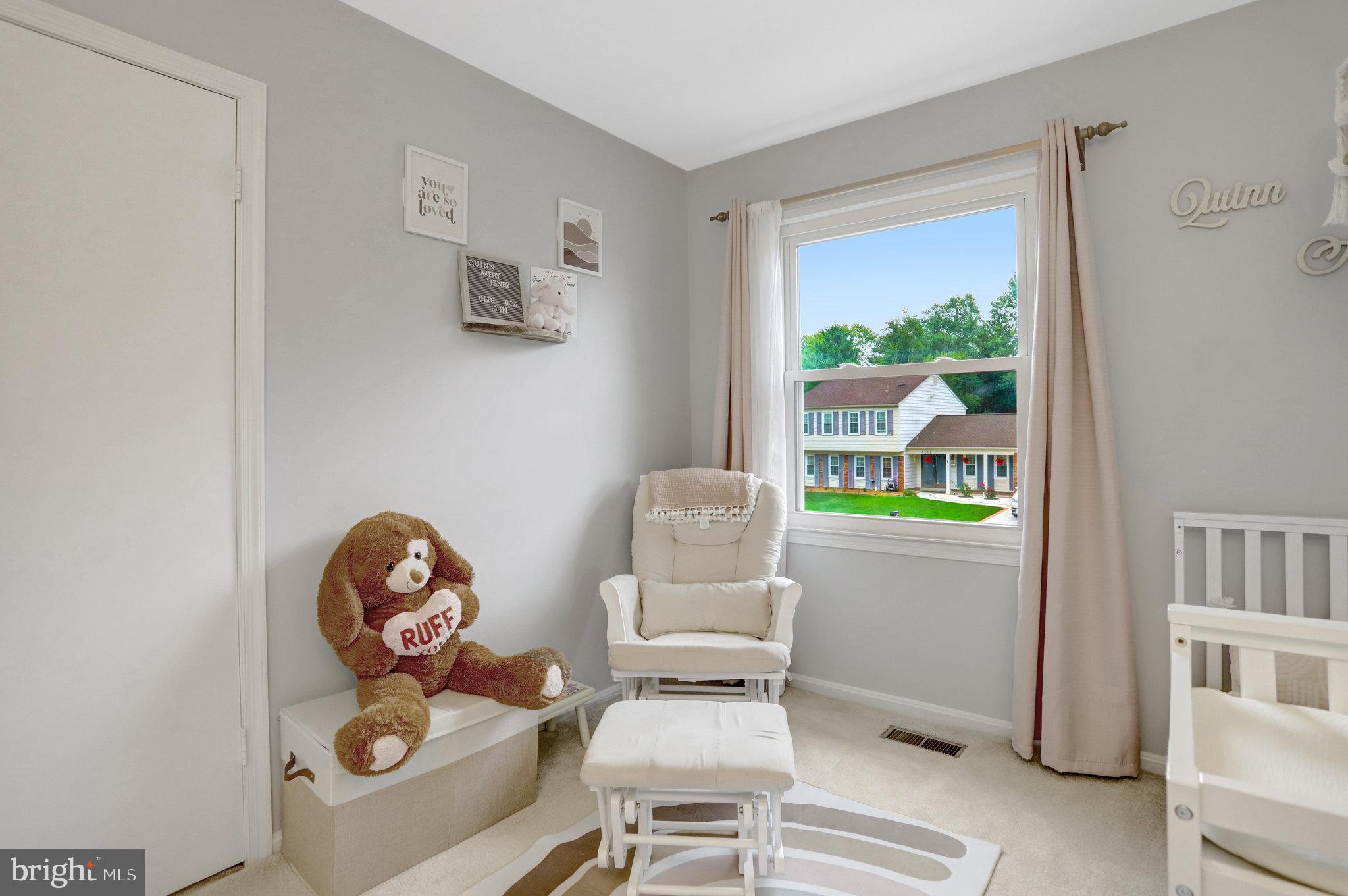 4518 Flintstone Road Alexandria, VA 22306 - Photo 33 of 62 a living room with furniture and a window
