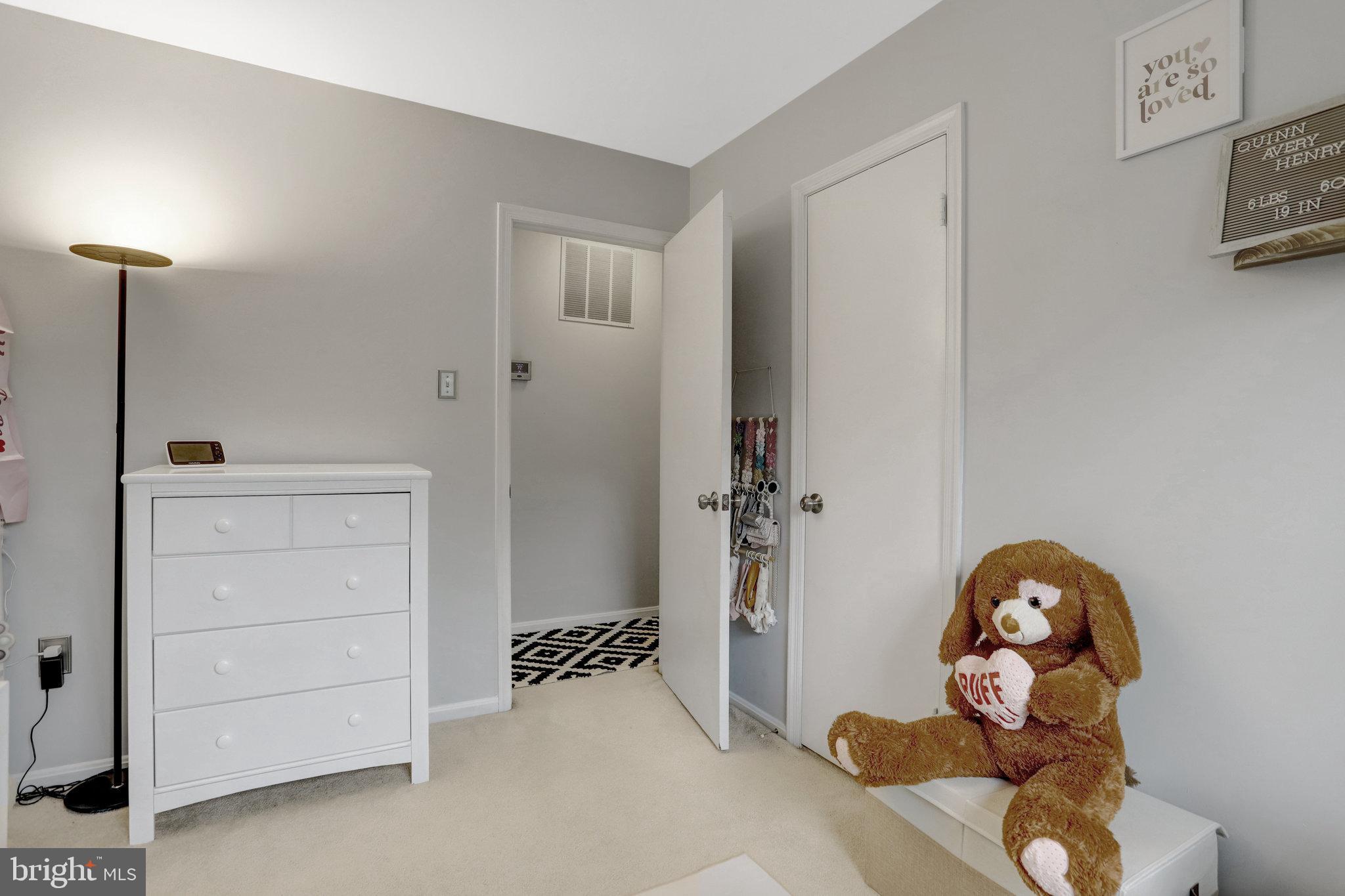 4518 Flintstone Road Alexandria, VA 22306 - Photo 35 of 62 a view of a livingroom with wooden floor and cabinet