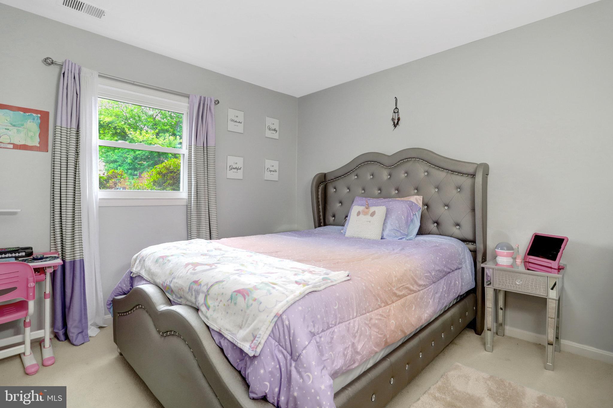 4518 Flintstone Road Alexandria, VA 22306 - Photo 42 of 62 a bedroom with a bed and a window