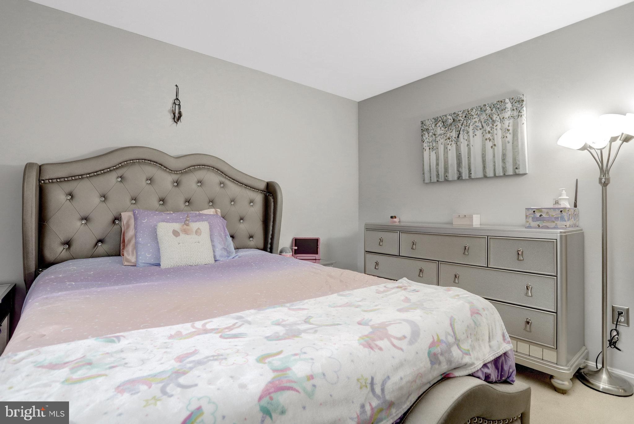 4518 Flintstone Road Alexandria, VA 22306 - Photo 44 of 62 a bedroom with a bed and a cabinets