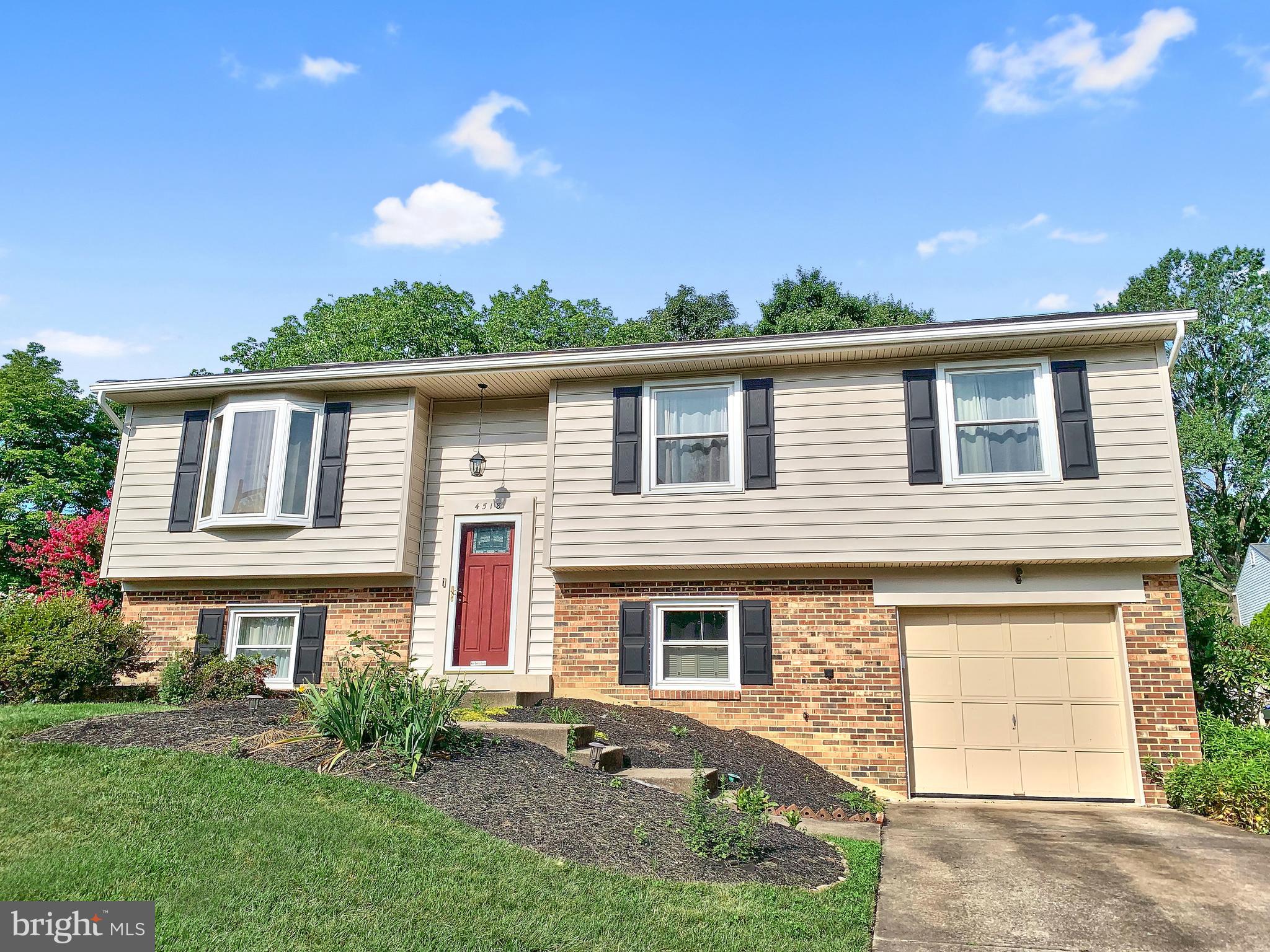 4518 Flintstone Road Alexandria, VA 22306 - Photo 5 of 62 a front view of a house with garden