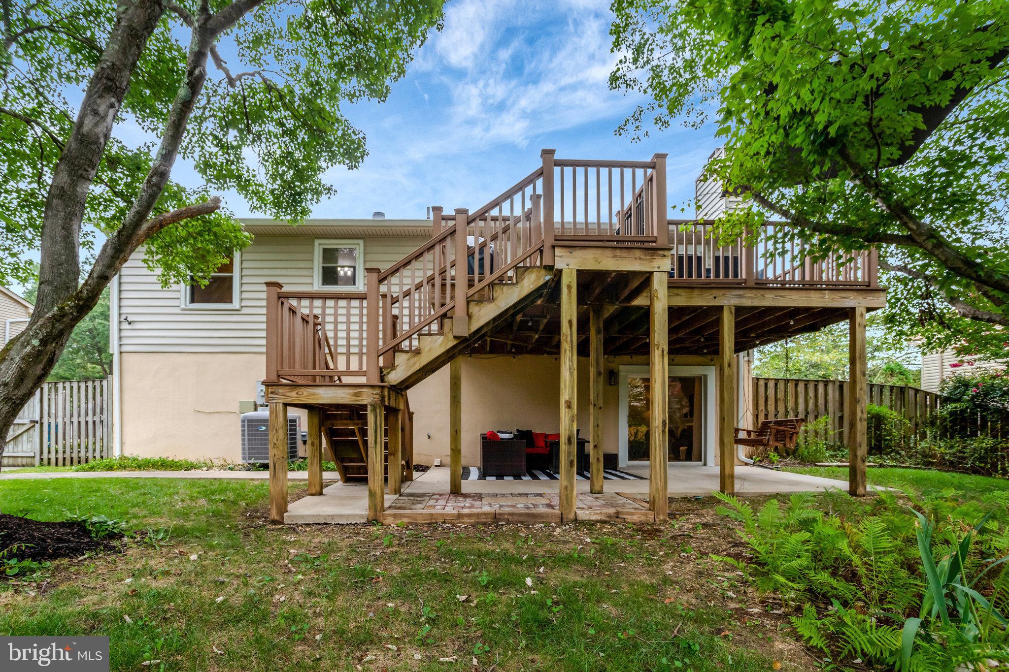 4518 Flintstone Road Alexandria, VA 22306 - Photo 60 of 62 front view of a house with a yard
