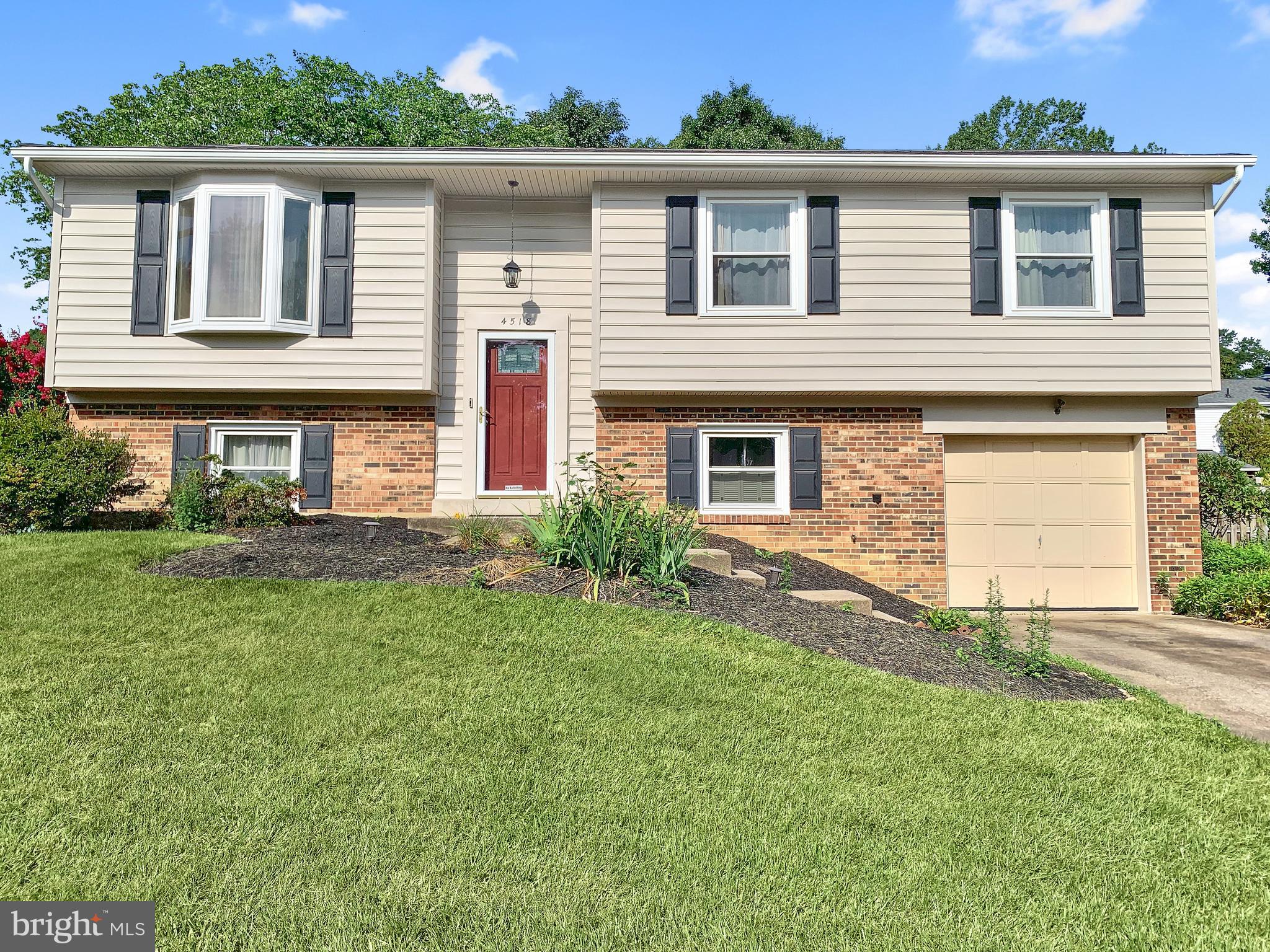 4518 Flintstone Road Alexandria, VA 22306 - Photo 6 of 62 front view of a house with a yard
