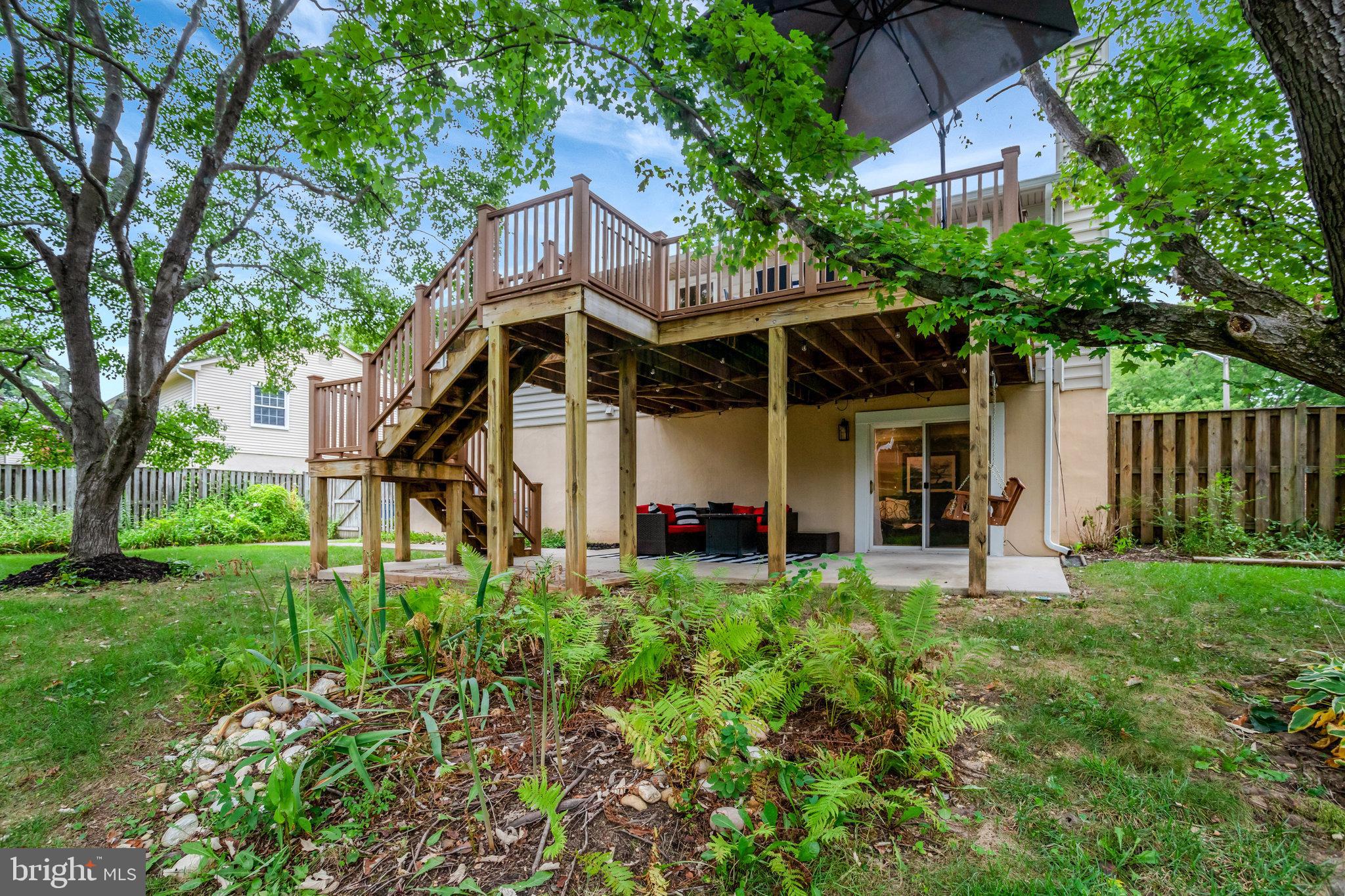 4518 Flintstone Road Alexandria, VA 22306 - Photo 61 of 62 a front view of a house with a yard