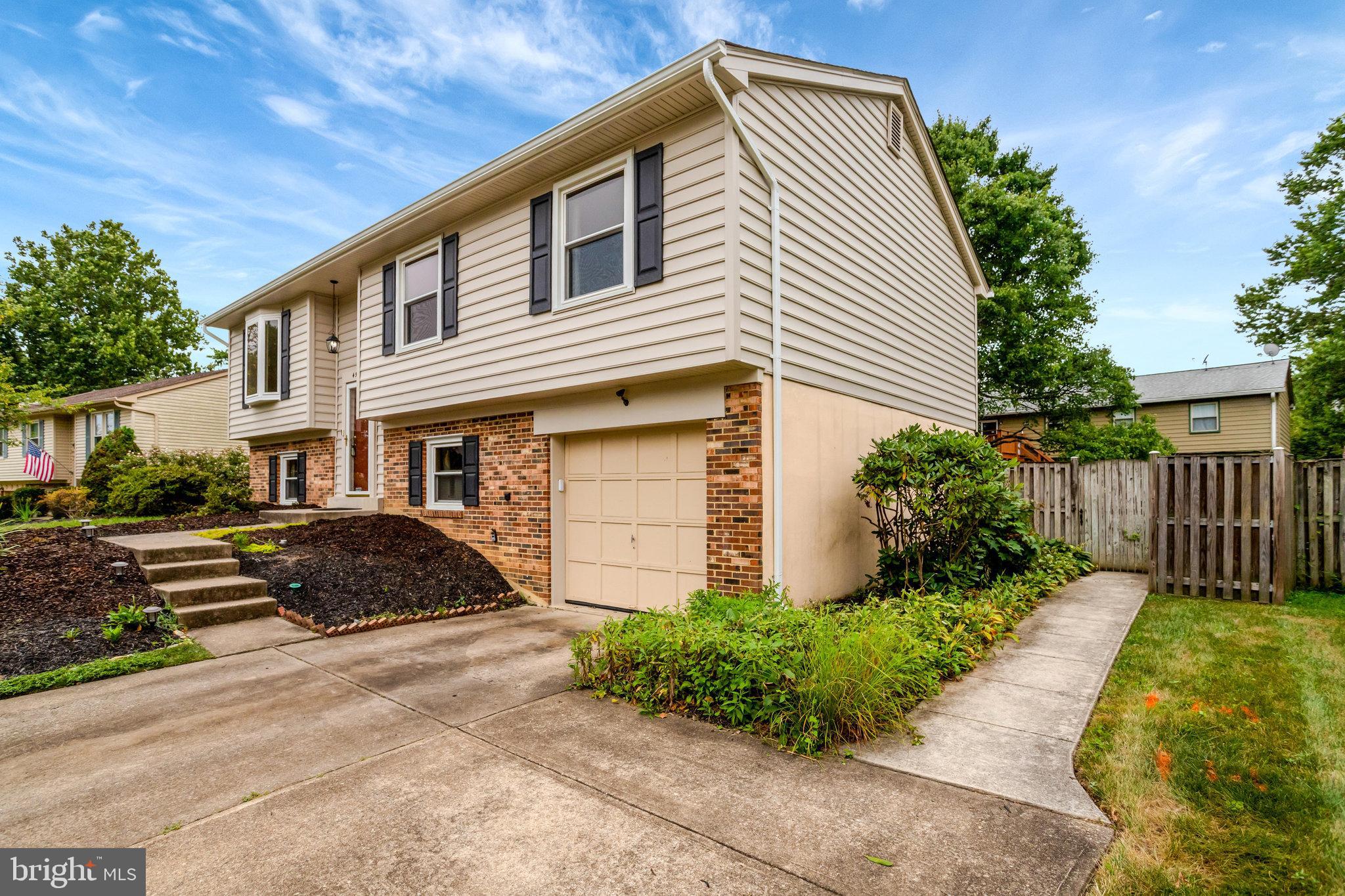 4518 Flintstone Road Alexandria, VA 22306 - Photo 7 of 62 a front view of a house with garden